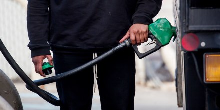 A person pumps gas at a gas station in Brooklyn, NY on March 8. The U.S. national average for a gallon of regular gasoline hit a fresh record high of 4.173 dollars on Tuesday, according to data from the American Automobile Association.