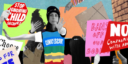 Photo collage showing a person wearing a multi-colored vest and a beanie that read,"Clinic escort" with her left hand to the left and right one gesturing forward. She is standing amidst protest signs that read,"Stop ignoring child sacrifice", "Bans off our Bodies" and "No Compromise with Abortion".