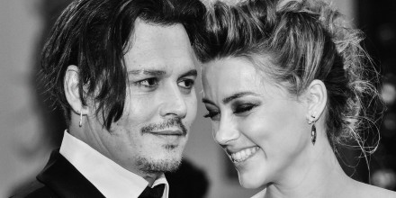 Amber Heard and Johnny Depp arrive for the screening of "The Danish Girl" at the 72nd Venice International Film Festival on September 5, 2015, in Venice, Italy.