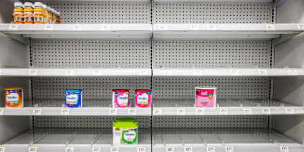 Image: Shelves normally meant for baby formula sit nearly empty at a store in downtown Washington, DC, on May 22, 2022.