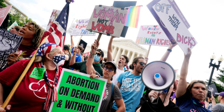 People protest about abortion  outside the Supreme Court