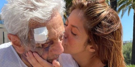 Shakira kissing her father, William, on the cheek after her suffered a fall.