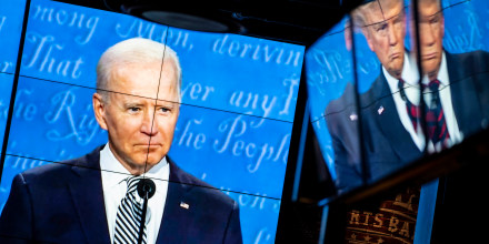 Television screens airing the first presidential debate between Joe Biden and Donald Trump are seen on Sept. 29, 2020, in Washington, D.C.