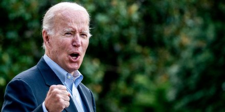 President Joe Biden answers a shouted question from a reporter while walking to Marine One on the South Lawn of the White House on Aug. 7, 2022.
