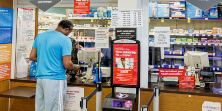 A man checks in at Navarro Discount Pharmacy