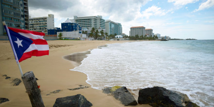 A Puerto Rican flag on an empty beach at Ocean Park, in San Juan, Puerto Rico, on May 21, 2020.