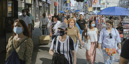 Pedestrians in Times Square in New York City on May 22, 2022.