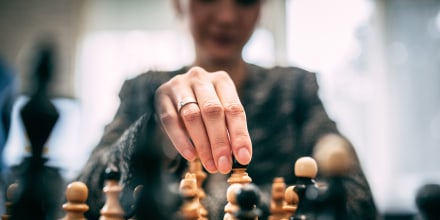 Woman playing chess