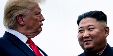 Former President Donald Trump and North Korea's leader Kim Jong-un talk before a meeting in the Demilitarized Zone on June 30, 2019 in Panmunjom, Korea. 