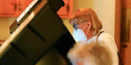 Voters cast their ballots in the Kansas Primary Election at Merriam Christian Church on August 02, 2022 in Merriam, Kansas. Voters in Kansas will decide on whether or not to remove protection for abortion from the state's constitution.