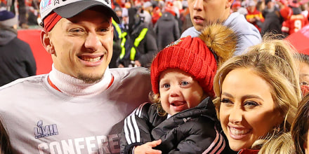 Patrick Mahomes #15 of the Kansas City Chiefs celebrates with family after defeating the Cincinnati Bengals 23-20 in the AFC Championship Game.
