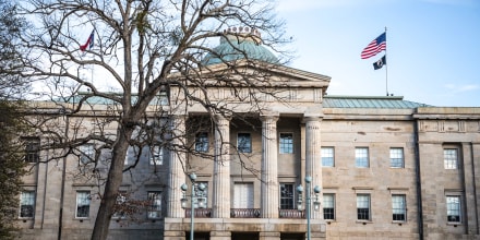 Law enforcement stand guard outside of the state capitol building in downtown Raleigh, N.C., on Jan. 17, 2021.