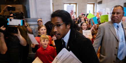 Democratic state Rep. Justin Jones enters the house chamber ahead of session as protesters demand action for gun reform laws the Tennessee State Capitol in Nashville