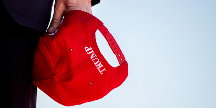 WACO, TEXAS - MARCH 25: Former U.S. President Donald Trump holds his cap during arrival at a rally at the Waco Regional Airport on March 25, 2023 in Waco, Texas. Former U.S. president Donald Trump attended and spoke at his first rally since announcing his 2024 presidential campaign. Today in Waco also marks the 30 year anniversary of the weeks deadly standoff involving Branch Davidians and federal law enforcement. 82 Davidians were killed, and four agents left dead. (Photo by Brandon Bell/Getty Images)