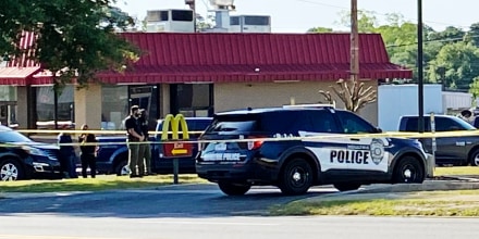 Police investigate a shooting at a  McDonald's restaurant on May 4, 2023, in Moultrie, Ga.