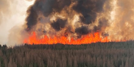 A wildfire burns near Evansburg, Canada