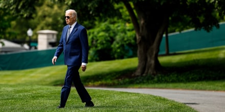 President Joe Biden walks on the South Lawn of the White House on May 10, 2023. 