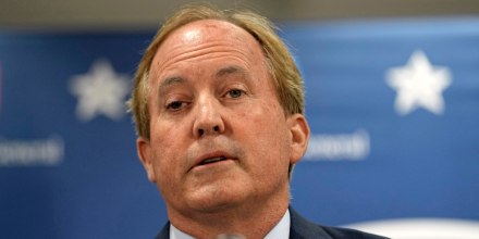 Texas state Attorney General Ken Paxton reads a statement at his office in Austin on May 26, 2023. 