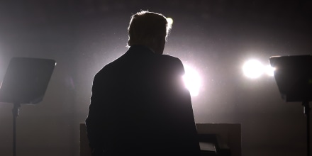 Former President Donald Trump speaks at a rally near Washington, Mich.