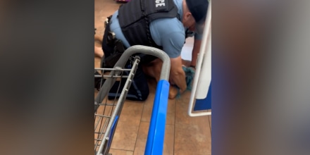 Video shows a man held down by police in a Kansas City Walmart