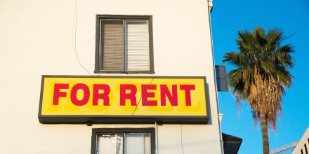 colorful for rent sign palm tree