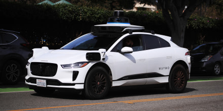 Self-driving Waymo cars on the road in Santa Monica