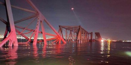 The Francis Scott Key Bridge lies in the water, following an impact from a cargo ship.