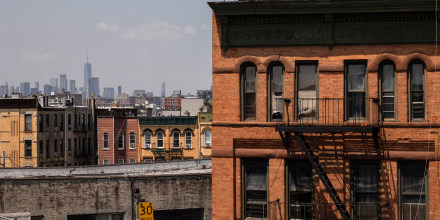 Residential apartment buildings in front of the Manhattan skyline in the Queens borough of New York