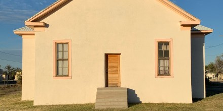 An exterior image of The Blackwell School building at sunset