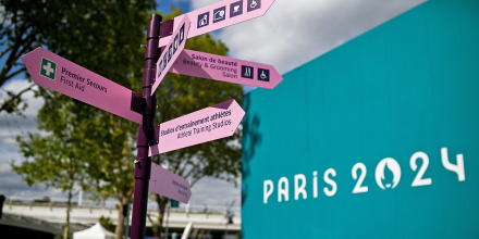 View of signage in the Olympic Village in Paris, France.