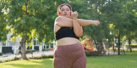 Woman stretching in park