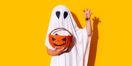 Child in ghost costume