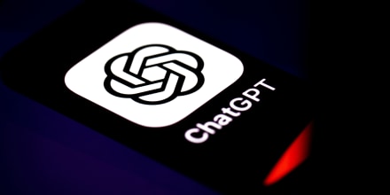 ChatGPT icon is displayed on a mobile phone screen
