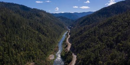 The Klamath River winds runs along state Highway 96 near Happy Camp, CA. All the dams are scheduled to come down by the end of 2024.