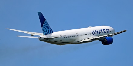 A Boeing 777-222 (ER) United Airlines plane taking off