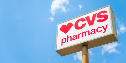The CVS pharmacy logo is seen outside of a storefront 
