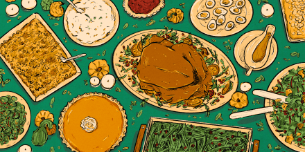 Series of thanksgiving dishes, such as turkey, pumpkin pie, green beans, and more, laid out on a table as seen from a bird's eye view.