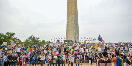 People protest.