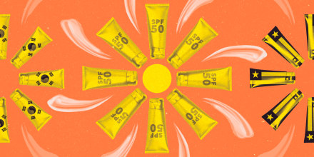 Sunscreen bottles and sunscreen lotion on a orange background