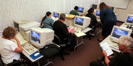 People use computers in a computer lab