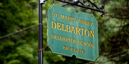 A sign that reads, "St. Mary's Abbey Delbarton School East Gate"