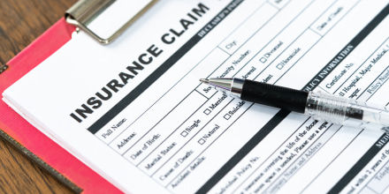 An Insurance claim form on a table