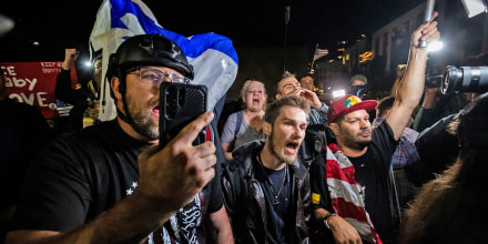 Trump supporters face off with protesters outside a U.S. Immigration and Customs Enforcement facility in Portland, Ore., on Oct. 6, 2025.