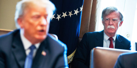 National security adviser John Bolton listens as President Donald Trump speaks.