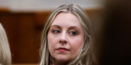 Abby Zwerner looks back while waiting for court to begin.