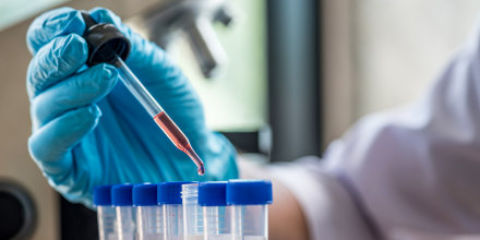 Cropped Hand Of Scientist Working In Laboratory.