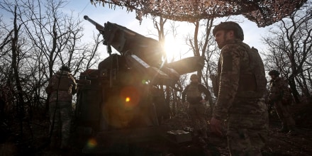 Ukrainian servicemen prepare to fire a self-propelled howitzer towards Russian troopsn near the front line town of Pokrovsk