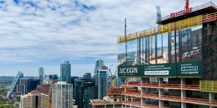  In an aerial view, apartments are seen undergoing construction downtown in Austin, TX. 