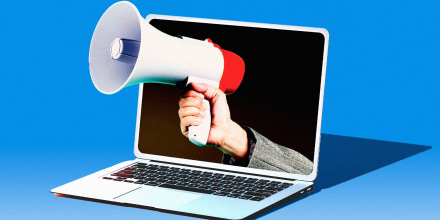 Photo illustration of hand holding a megaphone out of a laptop 
