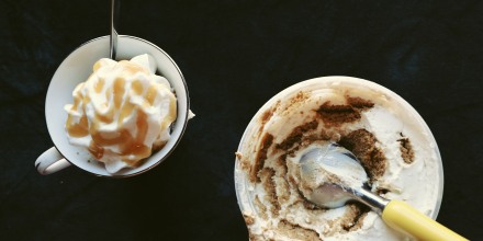 Japanese cheesecake yogurt made with biscoff cookies and Greek yogurt, topped with whipped cream and caramel.